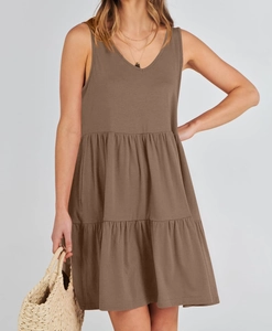 Detail of a brown V-neck sleeveless tiered summer dress with breathable pleated fabric