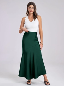 Detailed close-up of dark green satin skirt material and smooth silk-like texture fabric