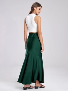 Elegant white sleeveless crop top with high-waist dark green satin maxi skirt