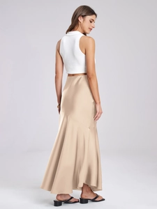 Detail of satin high-waisted midi skirt in champagne with elegant silky texture and gloss