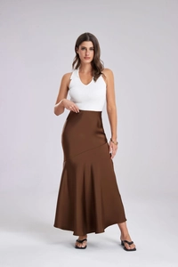 Detailed view of the elegant high-waisted satin maxi skirt with a smooth silk texture