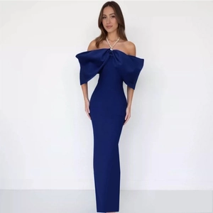 Elegant navy blue off-shoulder evening dress featuring a large bow and slim fit silhouette