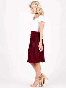 Elegant high-waisted pleated midi skirt in burgundy wine color with flowy silhouette