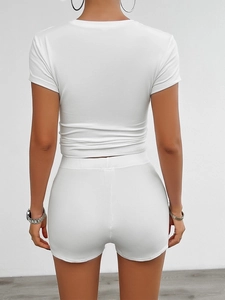 Rear view of white slim-fit short sleeve T-shirt and tight shorts sports set