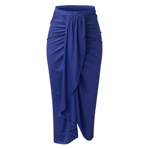 Detail view of the elegant ruched drape and asymmetric front slit on this navy midi skirt
