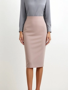 Detail of high-waist pencil skirt and long-sleeve blouse for business office attire