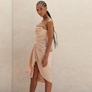 Elegant strapless apricot cocktail dress with ruched waist and asymmetrical split hem