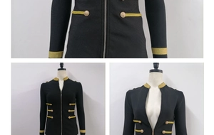 Detail of black bandage jacket featuring gold braided trim and decorative round buttons