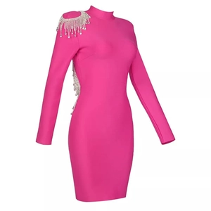 Pink bodycon long sleeve mini dress with sparkling rhinestone fringe on back and shoulder
