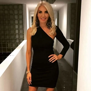Slim fit black asymmetric mini dress with one-shoulder long sleeve and backless detail