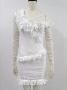 White one-shoulder lace mini dress featuring polka dot mesh and ruffled hemlines