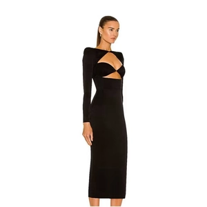Detail of the sexy cutout knot design on this slim fit black long sleeve dress