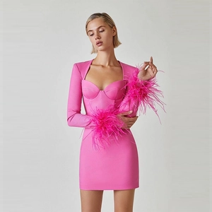 Elegant hot pink mini dress with feather cuffs and sweetheart neckline slim fit design