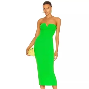 Detail of neon green strapless dress with slim fit cut and elegant front neckline notch