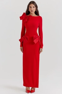 Detail of red bandage dress featuring waist cut-outs and large decorative bows
