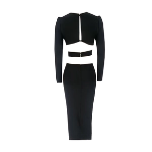 Detail of the back cutout design on the black slim fit long sleeve dress with metal buckles
