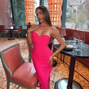 Hot pink strapless bodycon midi dress with structured pleated neckline for party