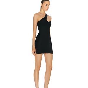 Detail of black ribbed knit texture on a one-shoulder mini dress with cutout