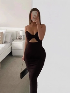Slim fit black sleeveless midi bandage dress with cutout bow detail and spaghetti straps