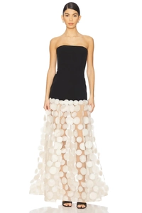 Detail of elegant black tube top dress with white 3D floral lace and sequin texture
