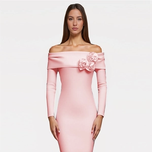 Close-up of pink off-the-shoulder neckline featuring three-dimensional fabric floral details