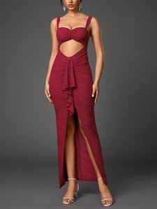 Close-up of wine red sequin dress with waist cut-out, ruffles and elegant high slit detail