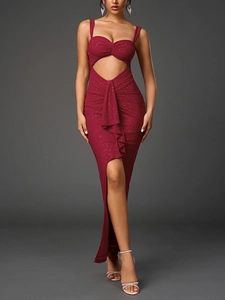 Detail of burgundy slit dress with silver glitter, cutout waist and ruffle accents