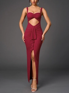 Detail of burgundy evening gown showing ruched bodice and waist cutout with sequins