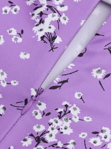 Detailed view of high-quality invisible zipper on purple floral vacation maxi dress