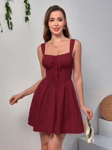 Detail of wine red A-line mini dress with square neckline and ruffled drawstring bust