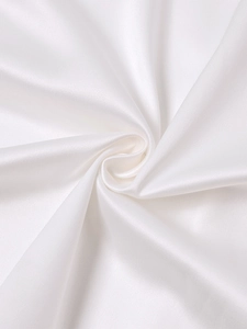 Detailed close-up showing the smooth texture and silky white satin fabric of the summer dress