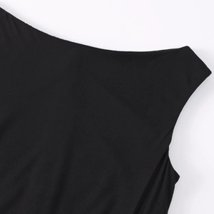 Detail of French style mesh patchwork and modal fabric on black slim fit midi dress
