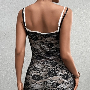 Detail showing the lace texture and backless design of the slim fit floral mini dress