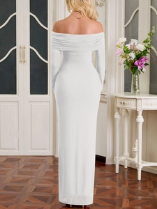 Detail of elegant ruching on the back of a slim fit white off-shoulder long dress