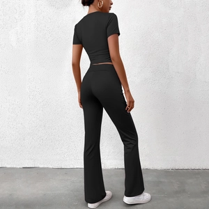 Ensemble sport noir pour femme avec haut court et pantalon évasé extensible d'été