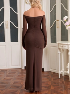 Detail view of ruched deep brown mesh dress showing backless design and slim fit silhouette