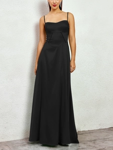 Detail view of high-quality matte satin fabric and elegant V-shape waist tailoring