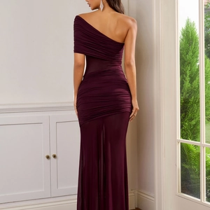 Elegant burgundy one-shoulder mesh dress with pleated waist and slim fit mermaid silhouette