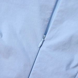 Detail showing the seamless invisible zipper on this light blue tencel dress fabric