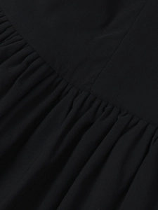 Detail of pleated black Tencel fabric showing professional tiered craftsmanship and texture