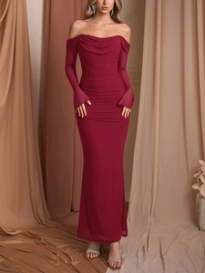 Detail of elegant burgundy ruched off-shoulder mermaid dress with draped neckline