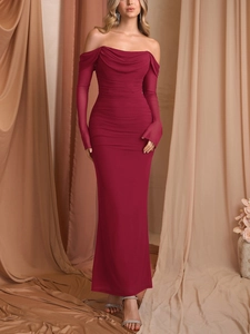 Detail of elegant burgundy off-shoulder dress featuring pleated mesh and long sleeves
