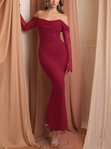 Detail view of the elegant off-shoulder neckline and mesh sleeves on this burgundy dress