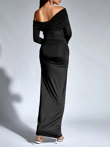 Close-up of the elegant black bodycon dress with ruching detail on the back and hips