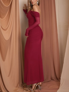 Detail view of burgundy off-shoulder dress with mesh sleeves and fine ruching details