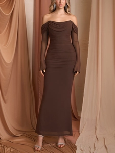 Close-up of ruched mesh fabric texture on dark brown off-shoulder evening dress