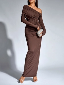 Detail of dark brown ruched bodycon dress with off-shoulder and floor-length design