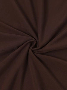 Macro shot of dark brown sheer mesh fabric with detailed honeycomb texture and pleats
