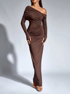 Detailed view of dark brown bodycon maxi dress with ruching and thumbhole long sleeves