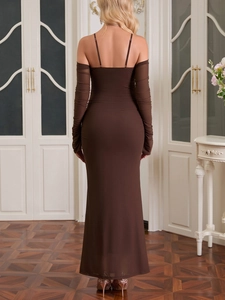 Detail of a brown backless bodycon maxi dress with matching sleeves and ribbed texture